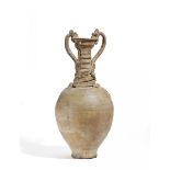 EXCEPTIONAL AMPHORA WITH DRAGON HANDLES. CERAMIC.China. Sui Dynasty, 518-618.Leather coloured shard,