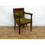 empire stoel, mogelijk Eeltjes
mahonie empire armfauteuil met rechte rug, versierd met gestoken