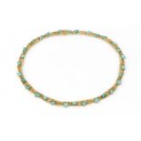 gouden ketting
18 krt. gouden choker in boomschors-stijl bezet met 28 cabochon geslepen groene