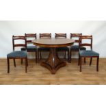 tafel met 6 stoelen
Hollandse mahonie biedermeier tafel met rond blad rustend op sluierpoot en set