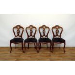 4 mahonie stoelen
set van 4 mahonie biedermeier stoelen met gebogen rug en rustend op gebogen poten,
