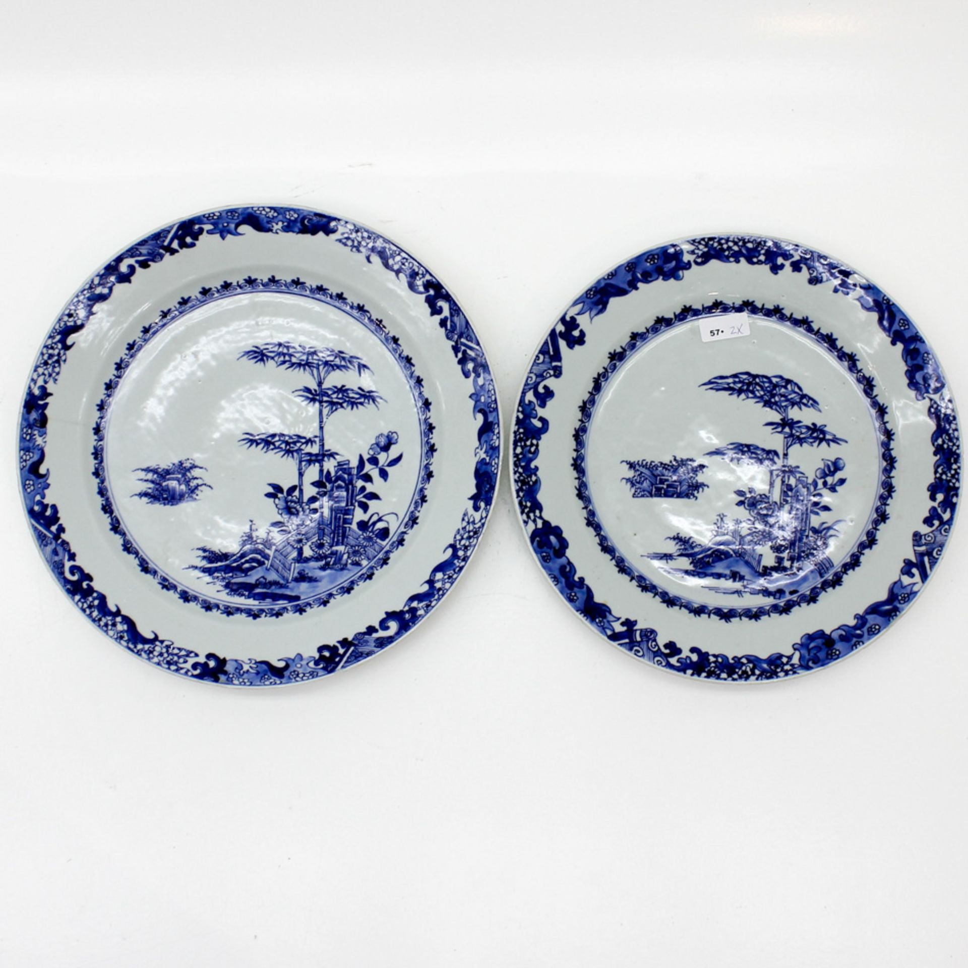 Lot of 2 18h Century China Porcelain Plates In blue and white floral decor, 1 with small hairline,