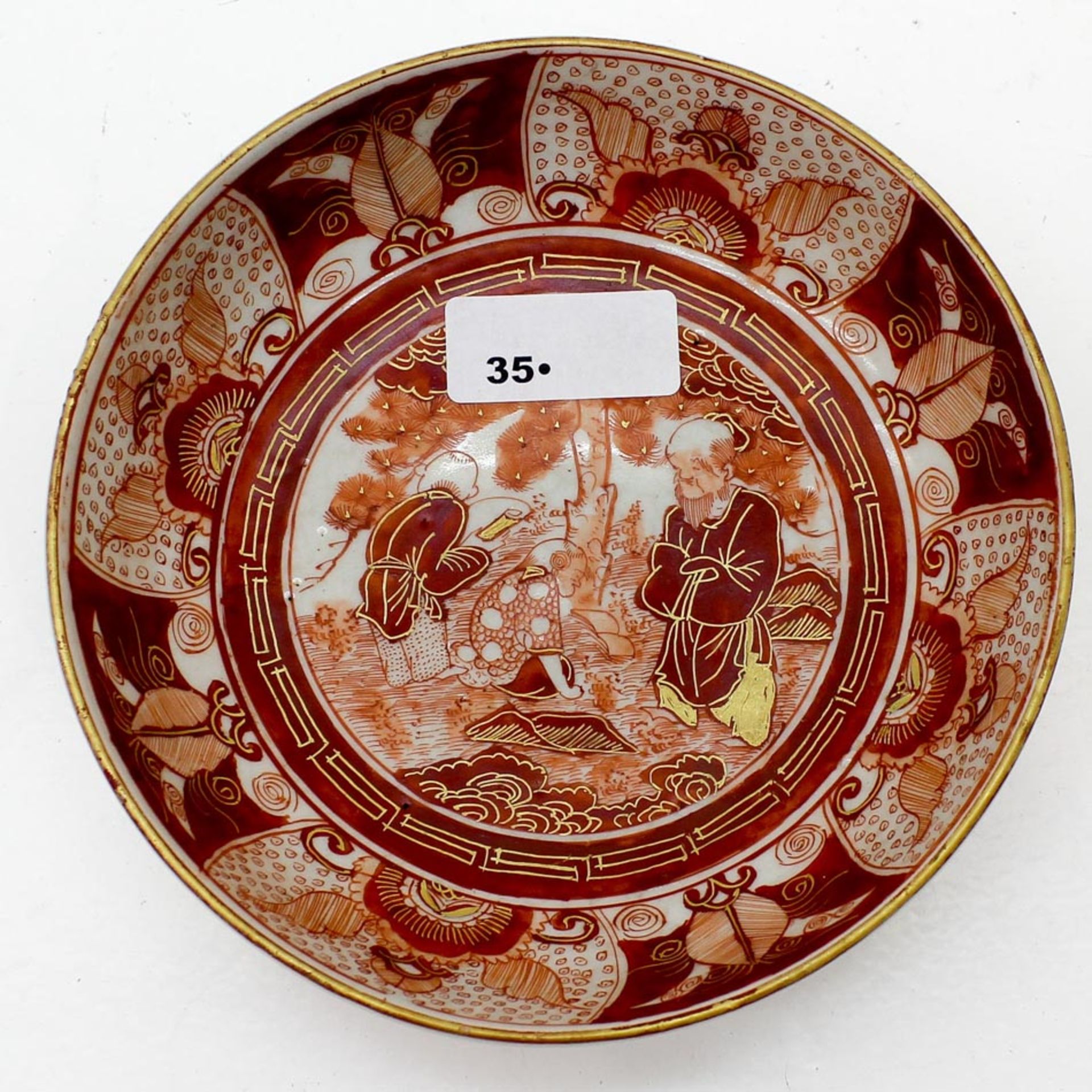 Japanese Porcelain Dessert Plate Decor in deep reds and corals, marked on bottom, small chip, 15