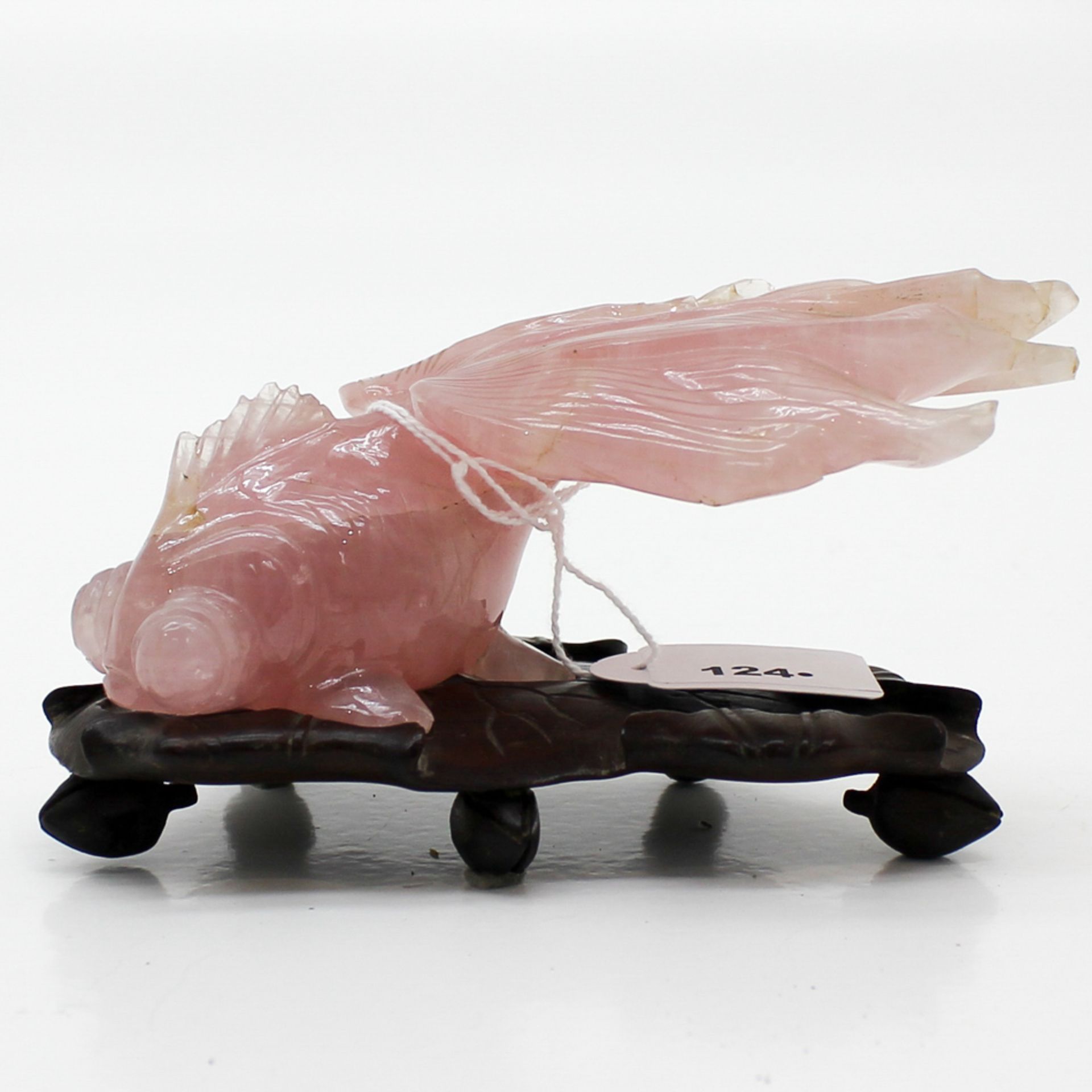 Carved Rose Quartz Chinese Koi Fish On wooden base, small chips on fin of Koi, 7 x 13 x 7 cm.