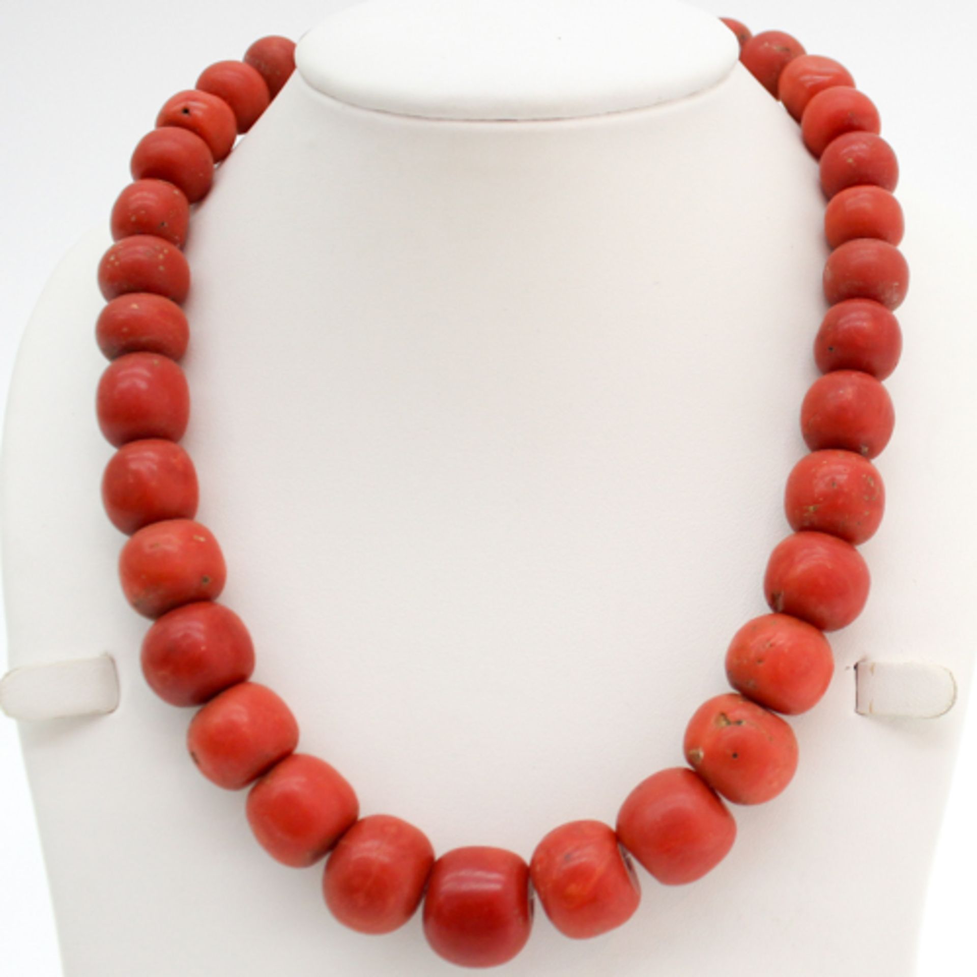 19TH CENTURY SINGLE STRAND RED CORAL NECKLACE Red coral is 13-17 mm in diameter, 139 gram.