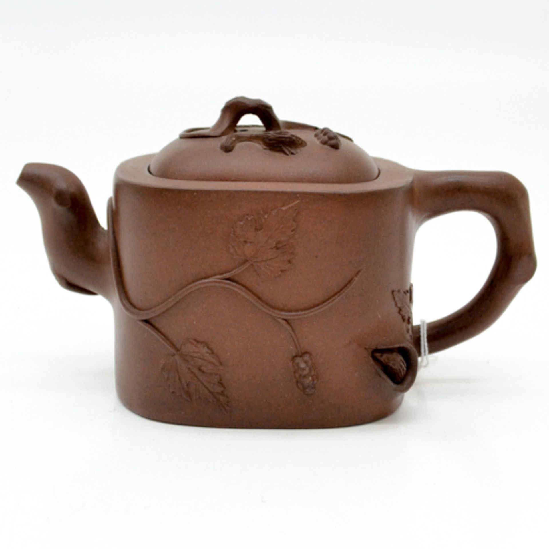 YIXING TEAPOT Decor of grapes and squirrels, Marked in lid and bottom, 11 cm tall.