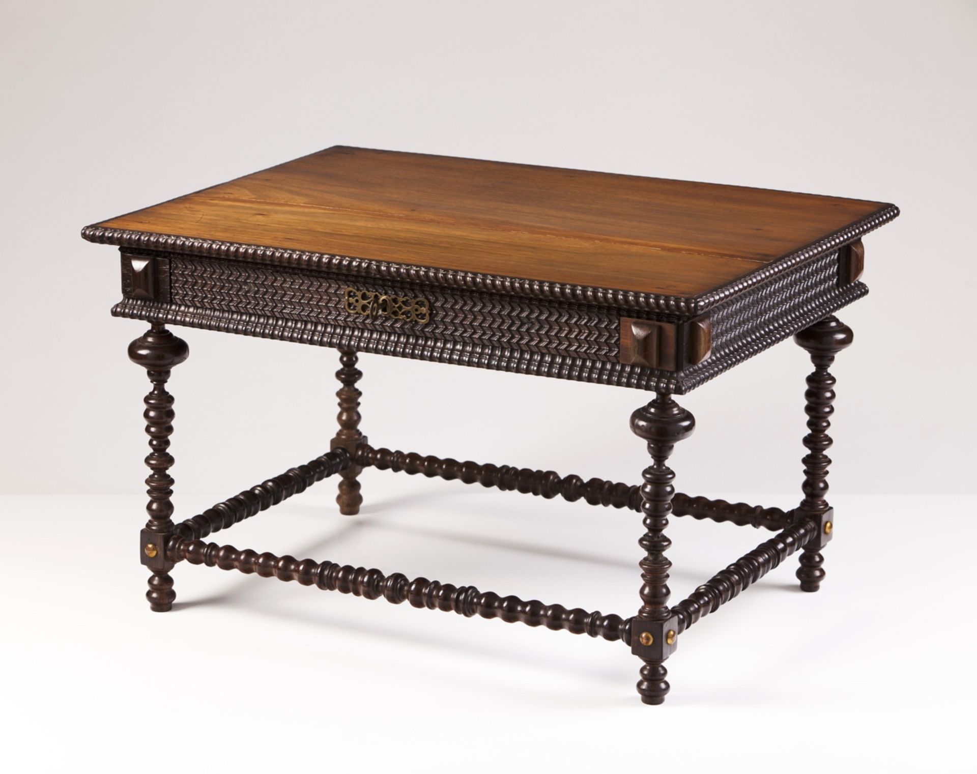 A 19th century rosewood miniature table  Spiral and ripple decoration  One drawer and turned