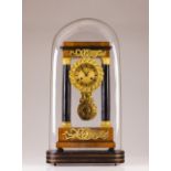 A 19th century Empire table clock  Verneered structure in walnut root and ebonized wood with