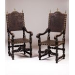 A pair of late 18th, early 19th century Portuguese armchairs  Ebonized wood  Engraved leather