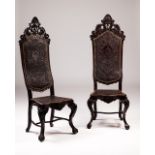 A pair of 19th century rosewood tall-back chairs  In the baroque manner  Carved Rosewood, engraved l