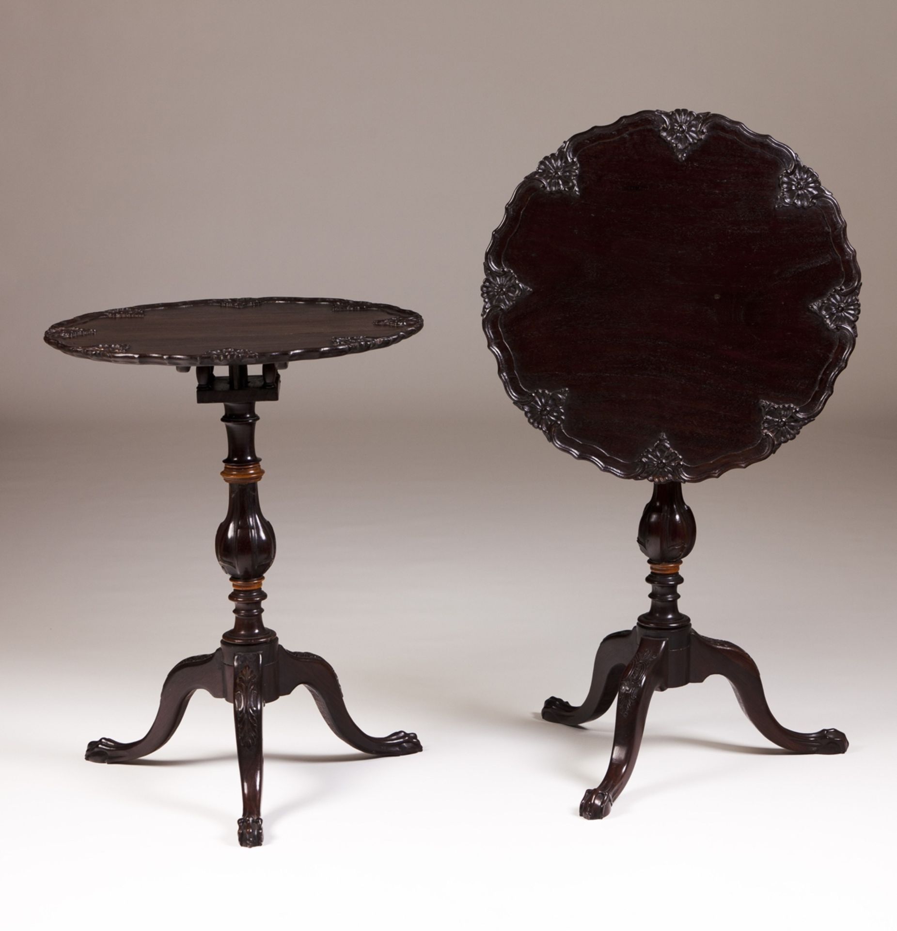 A pair of 19th century Portuguese tripod tables  Carved tilt-tops  Turned central stem with three