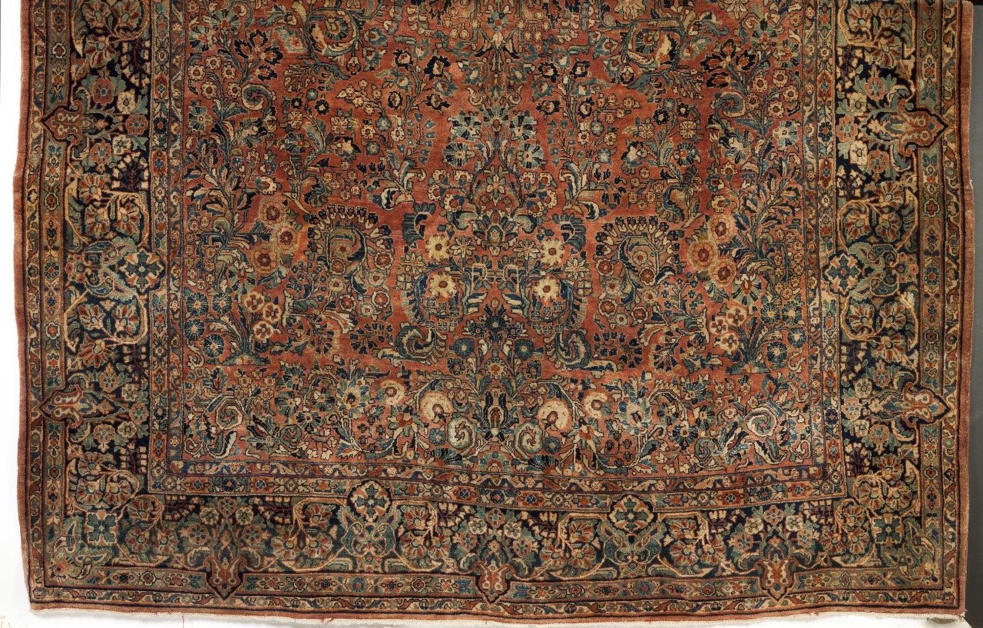 A Turkish carpet  Cotton and wool  Geometric decoration in ocher and blue    250x180 cm