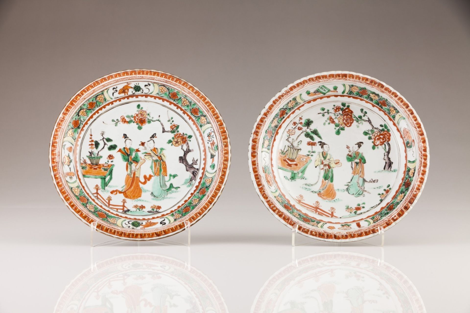 A pair of Kangxi plates  Chinese export porcelain  Fluted tab, polychrome Famille Verte decoration d