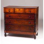 A Portuguese Romantic commode  Mahogany  Three short and three long drawers  Carved sides and