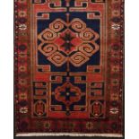 A Kurdistan Persian carpet  Cotton and wool  Geometric decoration in blue, red and orange