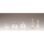 Three silver-mounted toilette flasks
One spherical with English silver cover and two conical with