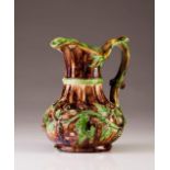 A jug
Portuguese faience
Decoration with wine leaves and grapes
Caldas da Rainha
Brown and green
