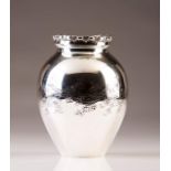 A Portuguese silver vase
Engraved decoration with flowers
Porto assay mark (1938-1984), maker's mark