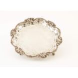 A late 19th, early 20th century Portuguese silver footed salver 
Relief and scalloped tab with