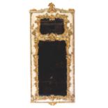 A Louis XV mirror
Carved, painted and gilt wood with floral motifs and shell motifs
France, 18th