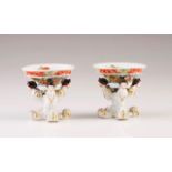 A pair of Meissen salt cellars
Meissen porcelain
Relied, polychrome and gilt decoration
Marked at