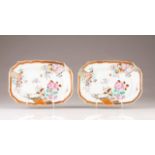 A pair of scalloped dishes
Chinese export porcelain
Polychrome and gilt decoration depicting