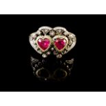 Ring

Set in silver and gold with red paste and rose cut diamonds
Faded marks
(wear signs, minor