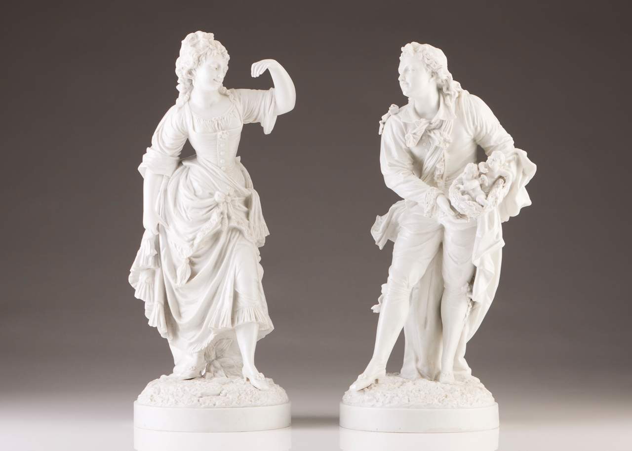 A pair of Neapolitan figures
Biscuit sculptures
Marked at the base
Europe, 19th century
(