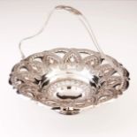 A Portuguese silver Art Deco basket
Pierced and scalloped decoration with geometric motifs,