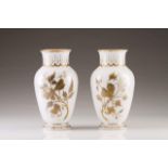 A pair of vases
White opaline
Decorated with butterflies and flowers in gold
France, 19th century
(