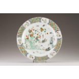 A charger 
Chinese porcelain
Famille Verte decoration with birds and flowers
Kangxi Period (1662-