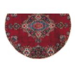 Mashad carpet
Cotton and wool
Floral design in red, blue and beige
Iran
(rare for its round