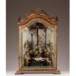A box-framed group sculpture
Terracotta group sculpture depicting Golgotha/ Pietá 
Polychrome and