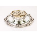 A Portuguese silver centrepiece
Flower bowl with stand
Relief decoration in the baroque manner