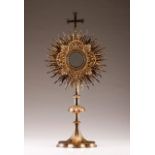 A 19th century French vermeil monstrance
Lobed base with engraved and relief decoration, hex knopped