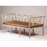 A D.Maria style settee
Painted wood
Decorated with landscapes with figures
Caned seat with