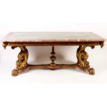 A dining table
Carved and gilt walnut, legs carved as dolphins
Two-toned marble top
Portugal, 20th