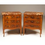 A pair of small Louis XVI style commodes
Burr-walnut and other woods veneered
Brass mounts and