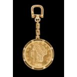 A gold key holder
Set with a 20 Dollars Liberty gold coin
(wear signs)


Peso total: 48 g