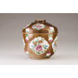 A large vase with cover
Chinese export porcelain
Chocolate decoration with polychrome reserves