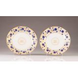 A pair of plates
Chinese export porcelain
Blue and gilt decoration with monogram at the center