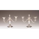 A pair of silver-plated candelabra
Three-light candelabra, relief decoration with floral motifs,