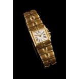 A gold RAYMOND WEIL wristwatch
Square case with white dial with black numbers
Gold bracelet