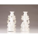 A pair of candlesticks
European porcelain
Stem decorated with feminine figure and floral motifs