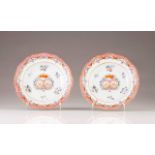 A pair of scalloped plates
Chinese export porcelain
Polychrome decoration with flowers, center