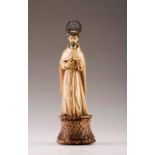 Saint Francis
Indo-Portuguese ivory sculpture
Traces of polychromy
Silver halo
Teak base
18th