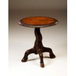 A side table
Chestnut
Carved central column and four zoomorphic feet
Carved top
Austria, 19th