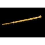 A late 19th, early 20th century gold pen
Chiselled decoration with floral decoration and elephant at