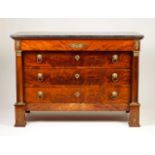 An Empire commode
Mahogany and burr-mahogany
Gilt-bronze mounts
Three long drawers
France, 19th