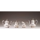 A Portuguese silver coffee and tea set
Spiral decoration, scroll handles, relief cover finials,